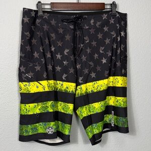 Pelagic Black and Yellow Star Pattern Boardshorts